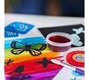 Less Mess Painting Activity Kit spill proof paint cup on table with brush and butterfly silhouettes