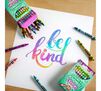 Colors of Kindness Crayons on top of be kind coloring page. 